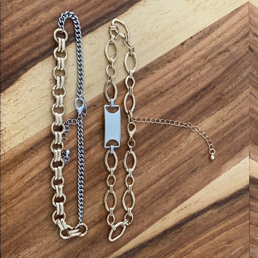 Set of two silver and gold toned choker necklaces